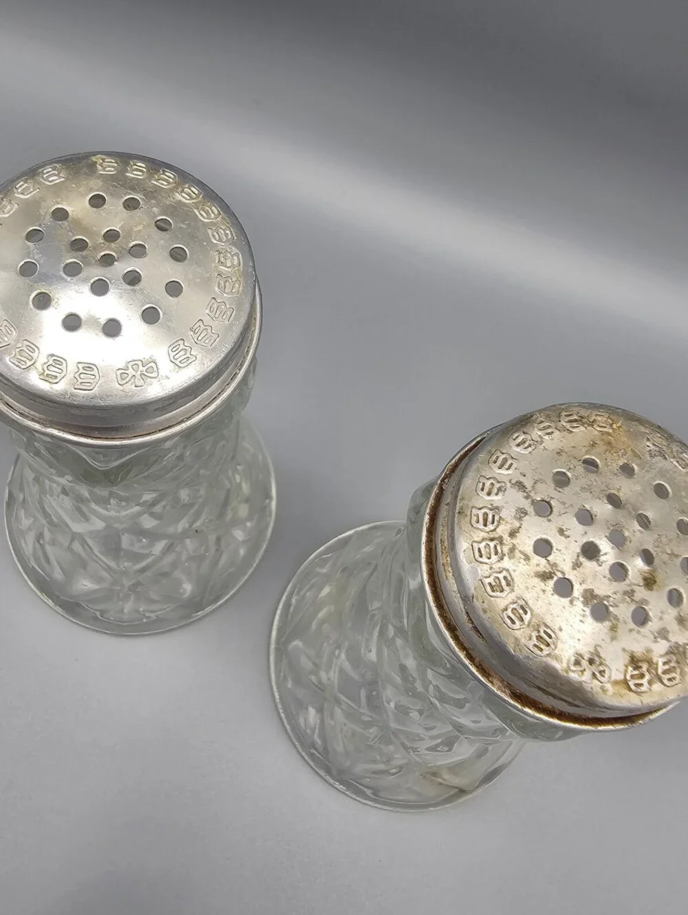 Vintage Glass Salt and Pepper Shakers with Silver-Tone Metal Caps